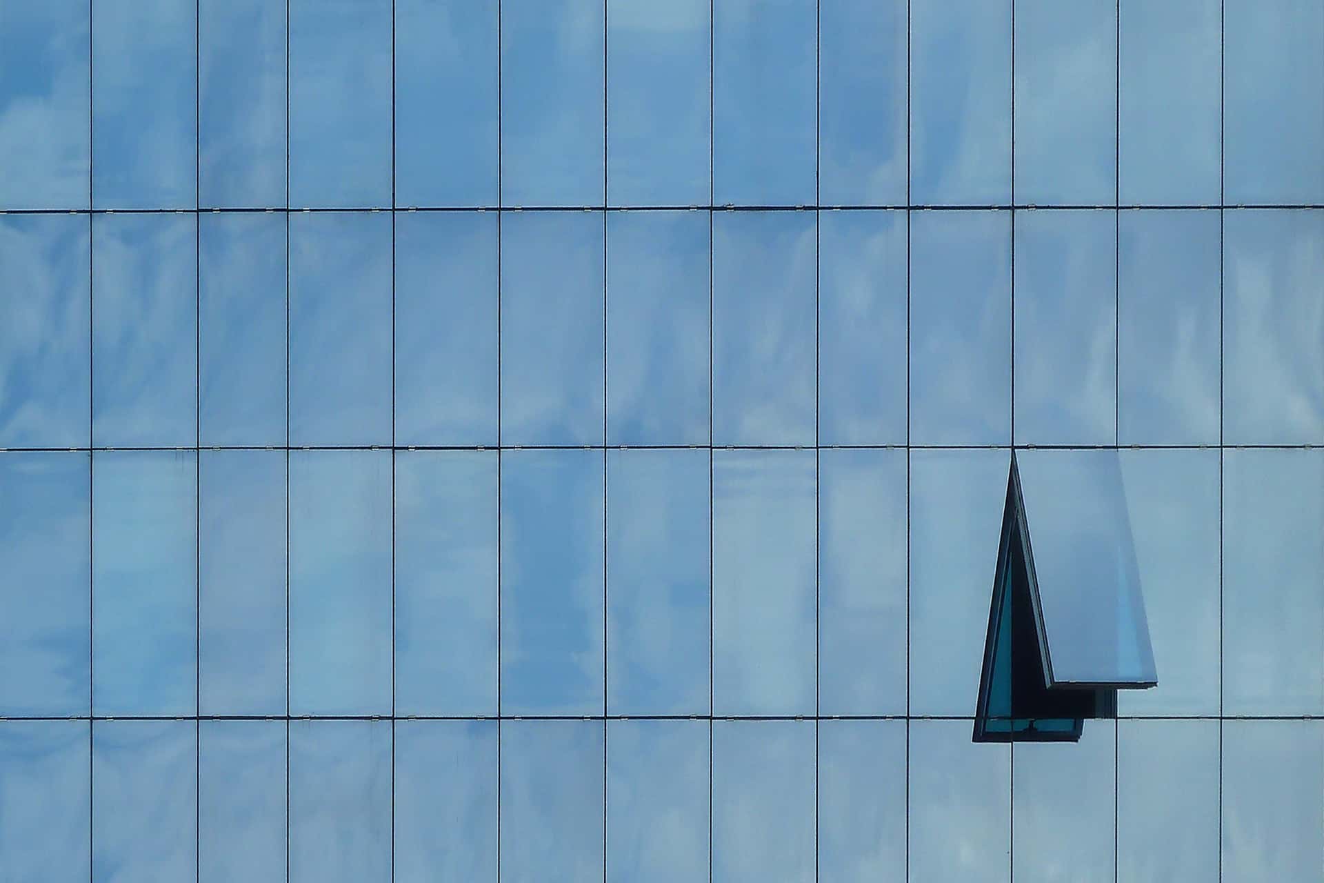 One open window in a building full of windows.